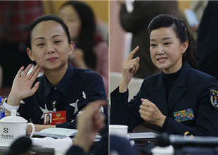 两会现场:宋祖英熟练使用手语与邰丽华交流